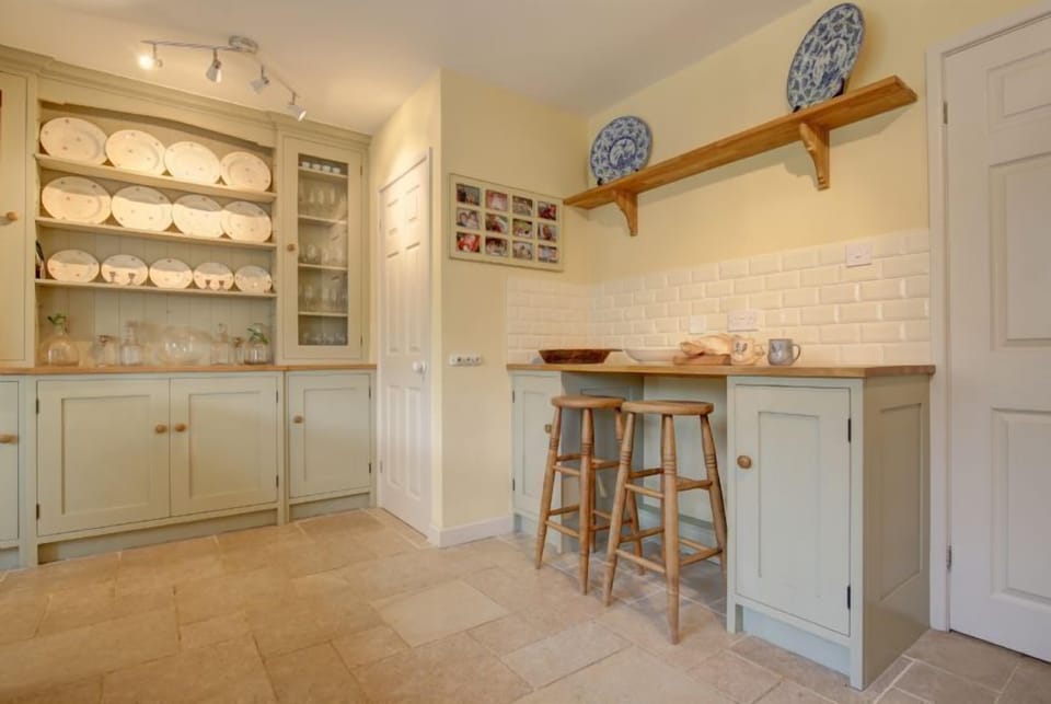 Ground floor: Kitchen with built-in dresser and breakfast bar
