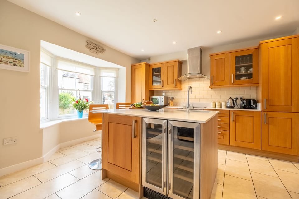 Ground floor:  The front doors open to the kitchen