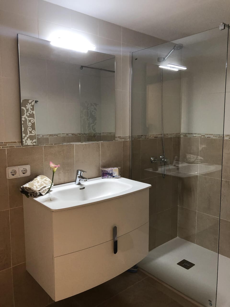 En suite shower room from Master Bedroom pool level.