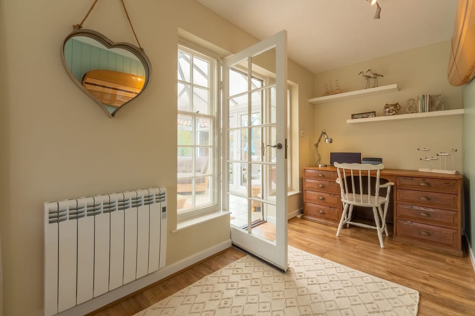 Ground floor: Sitting room leads to the conservatory