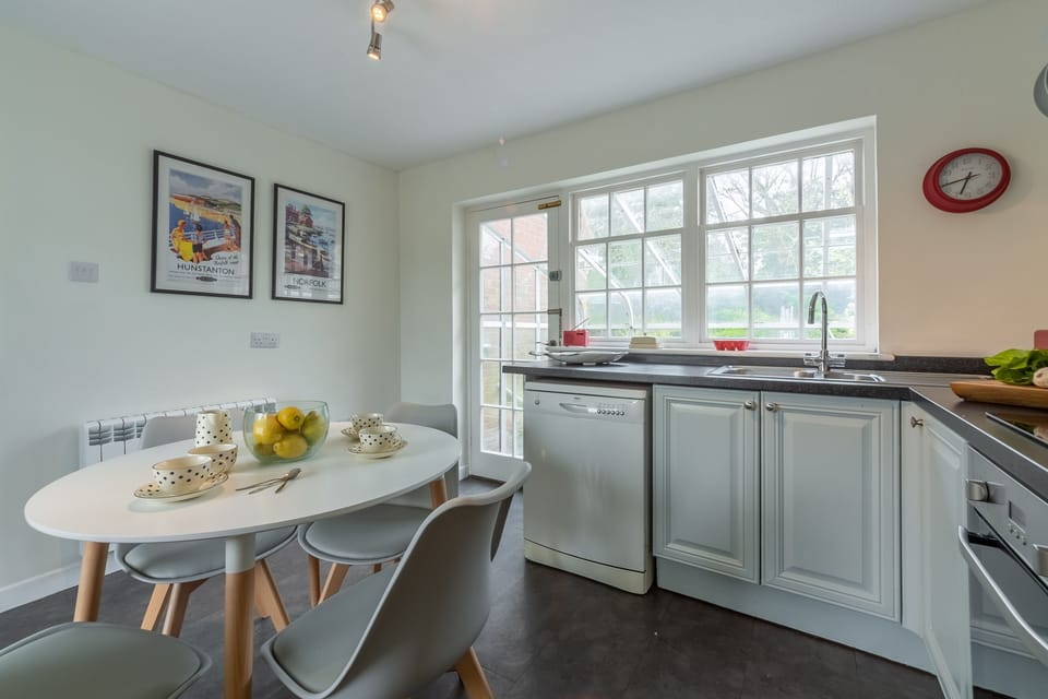 Ground floor: Kitchen with table and seating for four