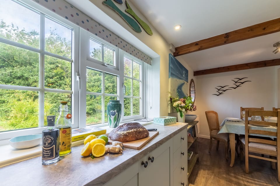 Columbine Cottage, Holme: Bright galley style kitchen