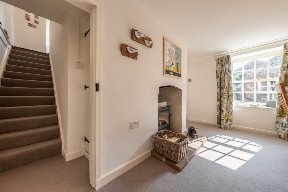 Ground floor: Stairs from dining area to first floor