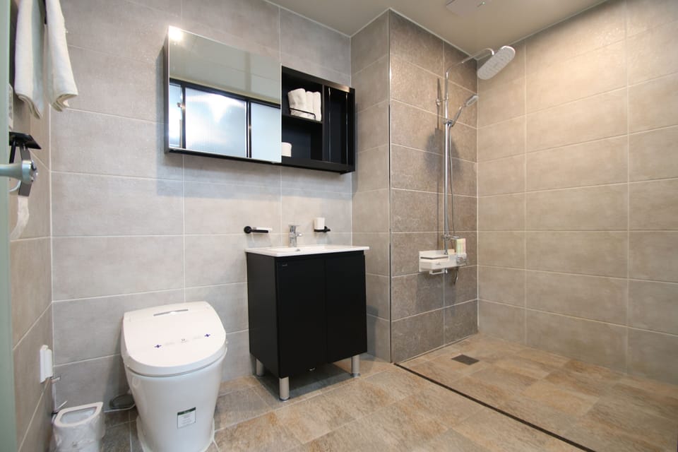 Hair dryer, bathrobes, slippers, bidet