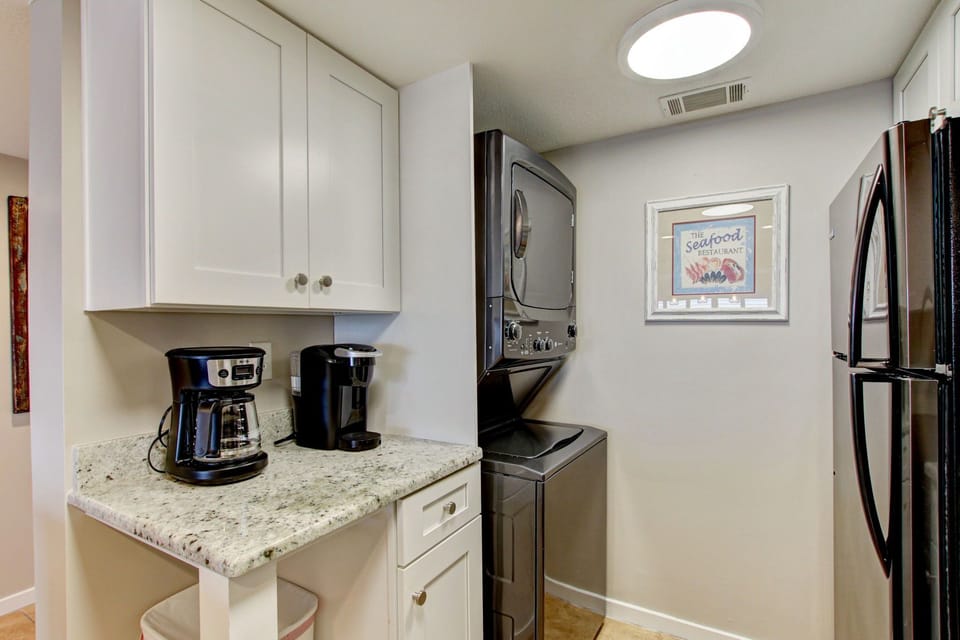Upgraded Kitchen Featuring Granite Countertops and New Stainless Steel Appliances