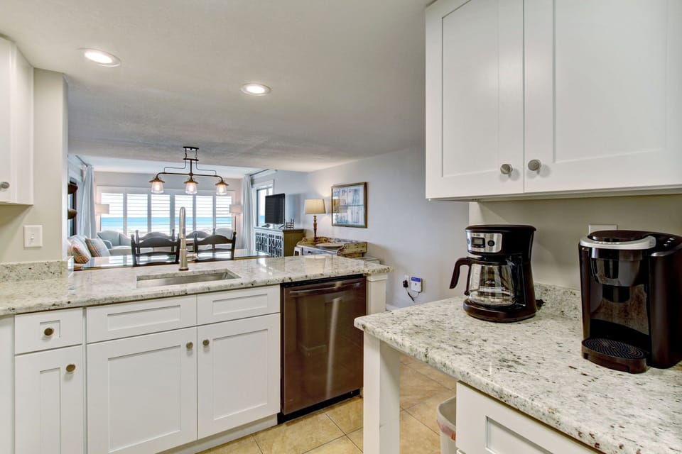 Upgraded Kitchen Featuring Granite Countertops and New Stainless Steel Appliances