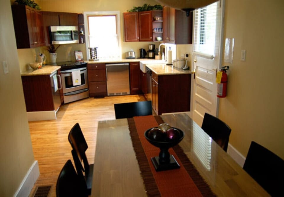 Separate dining room with seating for 6 and an updated fully equipped kitchen - Gate St Cottage