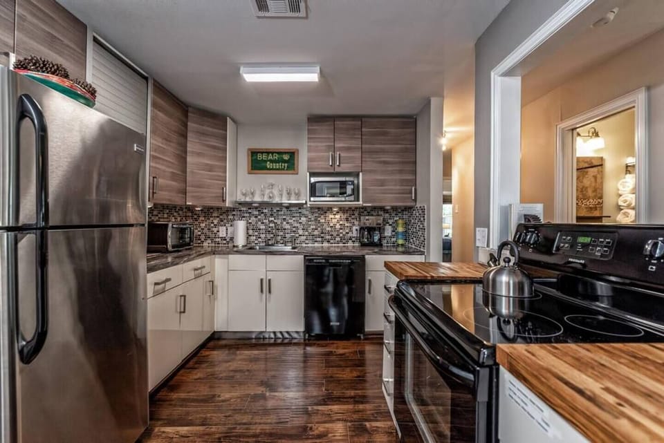 Fully stocked kitchen with a stove/oven, microwave, refrigerator, dishwasher, toaster oven, 12 cup coffee pot and coffee is provided.