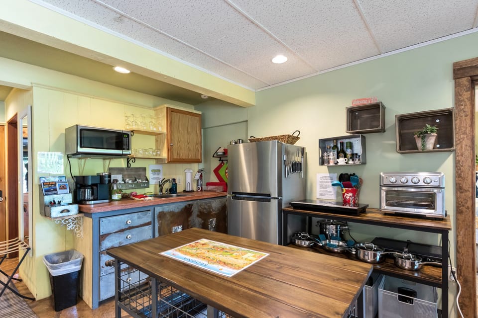 Kitchen view with fully stocked amenities for all varieties of cooking.