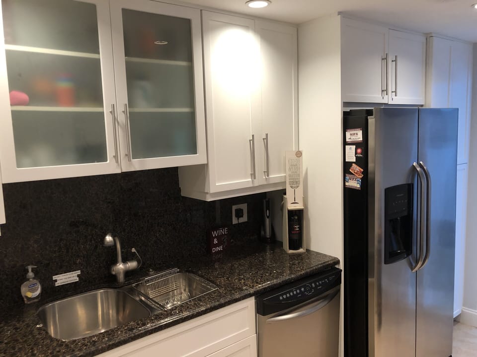 Plates, silverware, pots, pans & utensils fully stocked for guests. 