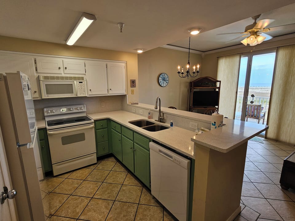 Kitchen with bar looking into the living area