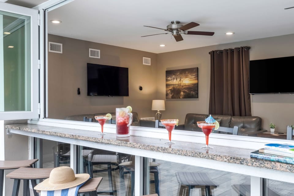 Atmosphere: Open-concept and massive, featuring multiple couches and sitting areas so the whole group can socialize.