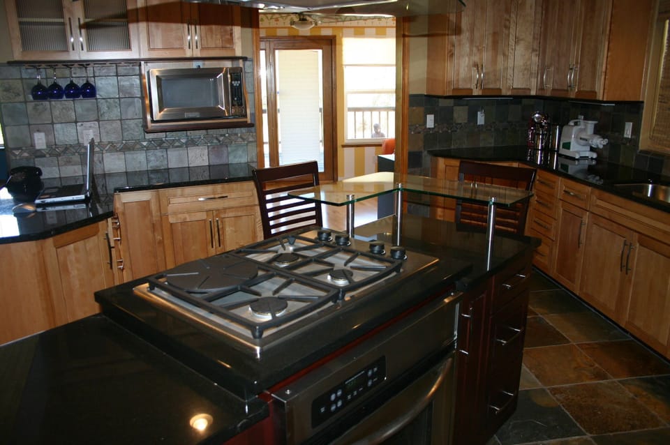 view of kitchen from gourmet cooking bar.