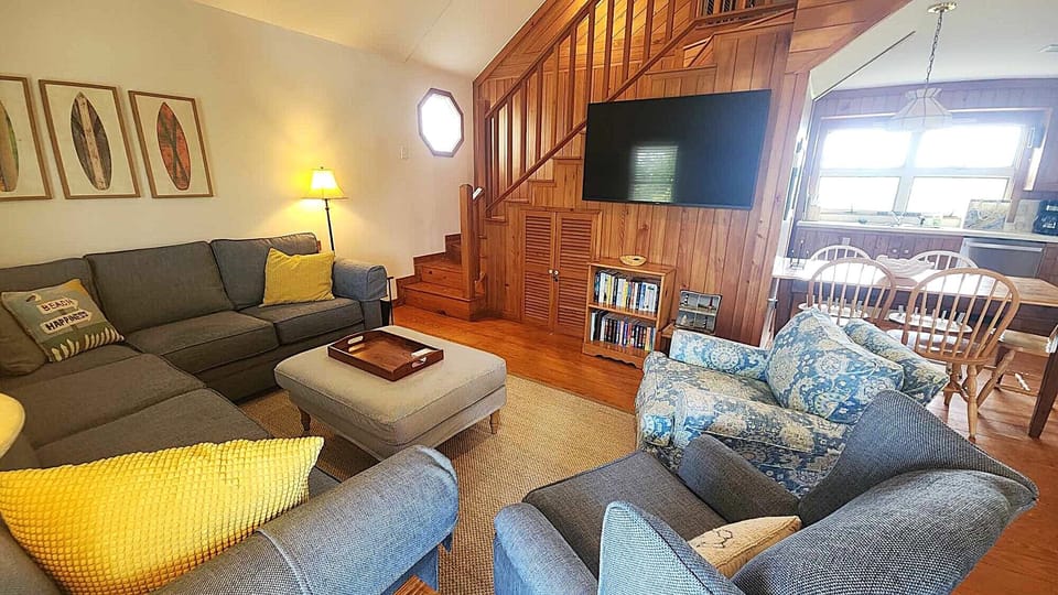 Living Area with Stairs to Queen Loft