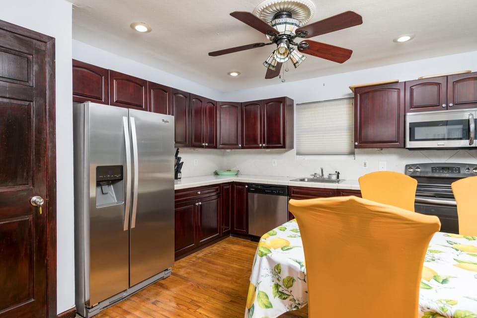 2nd Floor kitchen with tons of cabinets.  