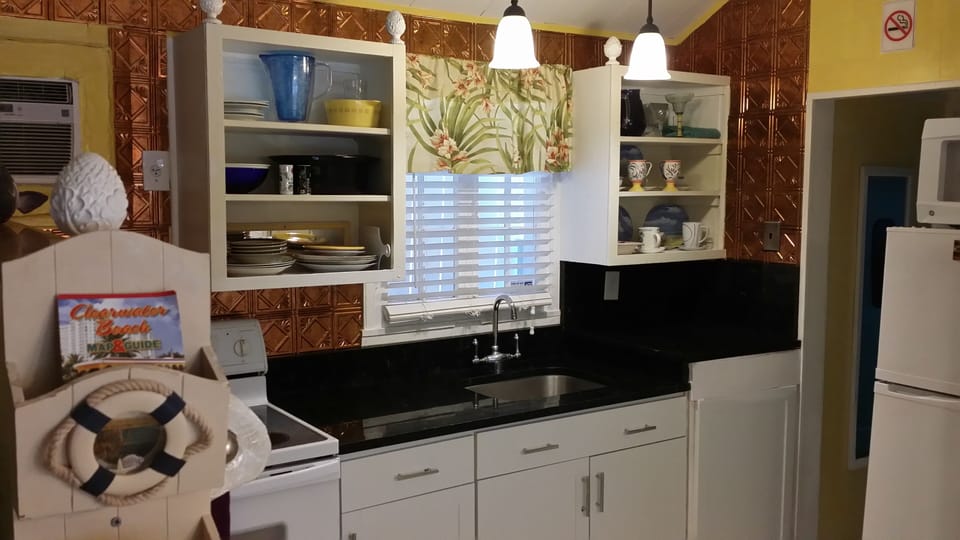 Copper walls, granite top kitchen  