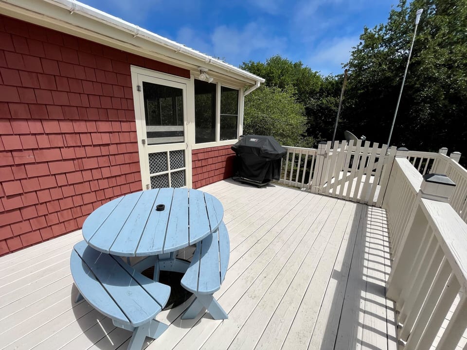 Gated Deck with Ramp, Stair Access, and a Gas Grill