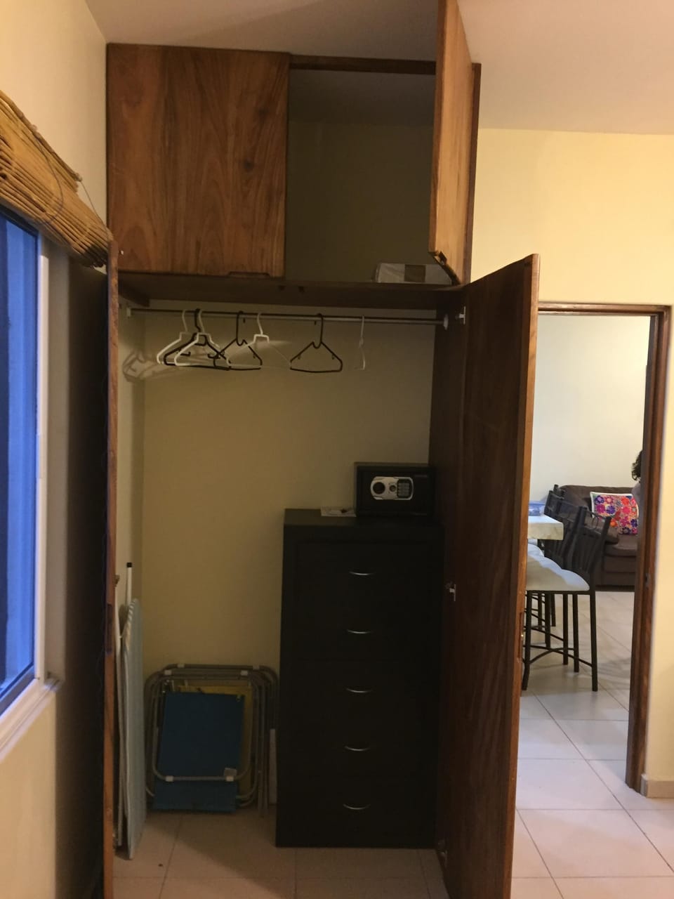 Closet of 2nd master bedroom,  door to living room and kitchen 