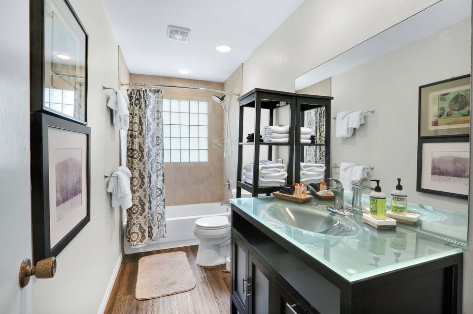 Second full bathroom with a shower/tub combo