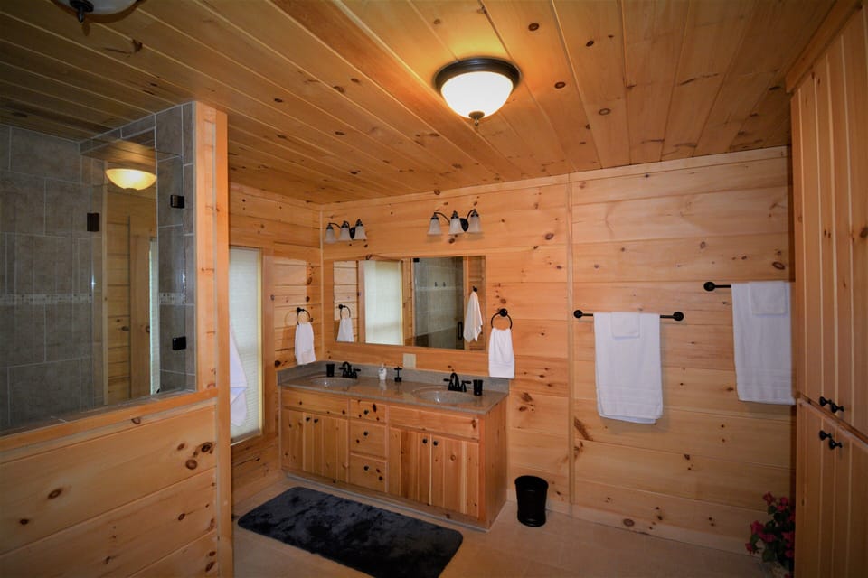Main Floor Master Suite with spacious Bathroom and Double Sinks