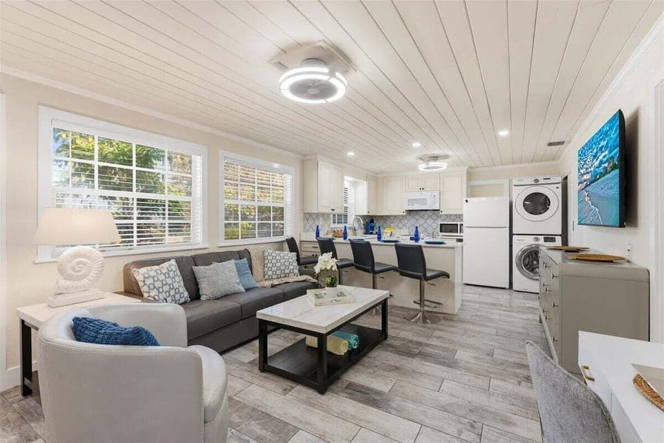 Spacious living room with smart tv. Perfect for unwinding with families and friends.