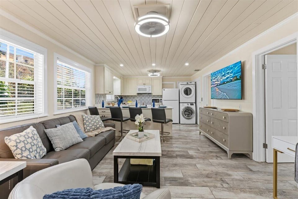 Spacious living room with smart tv. Perfect for unwinding with families and friends.