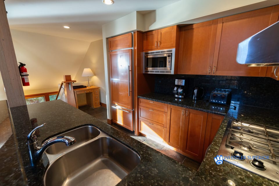 Bright kitchen with granite countertops