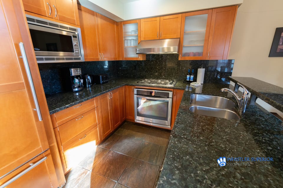 Bright kitchen with granite countertops