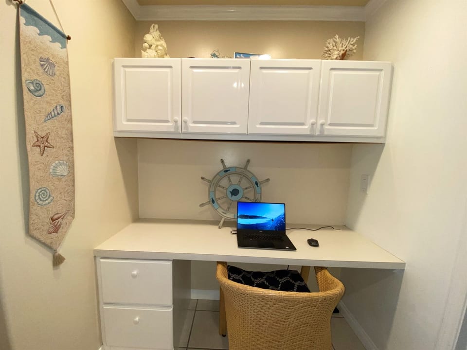 Quiet workspace in rear bedroom