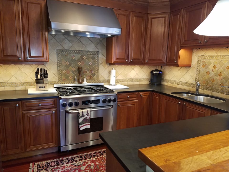 gas range with six burner top with exhaust fan
