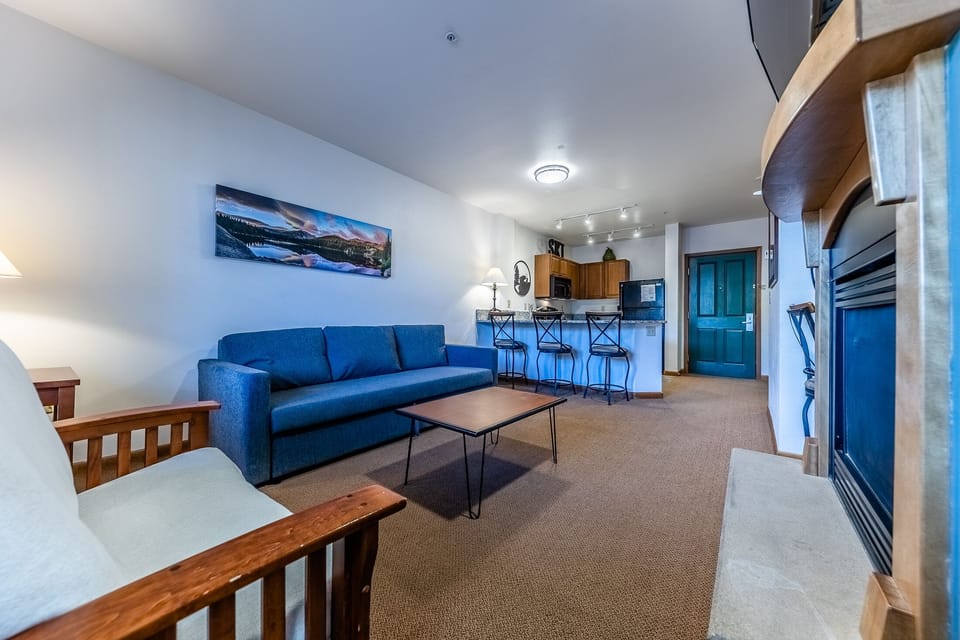 Living room - Beautiful living room with new sofa sleeper, futon sleeper, TV and fire place