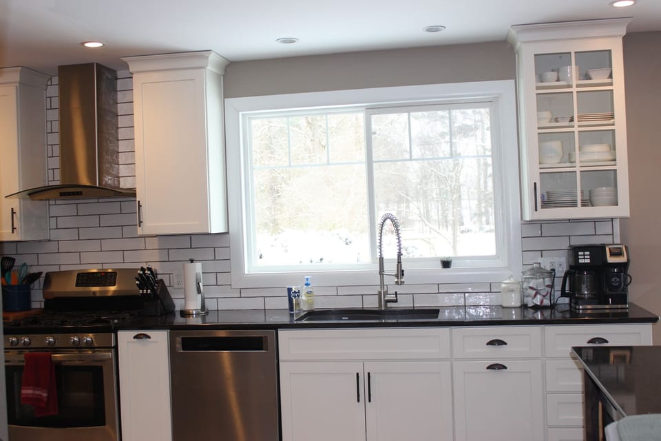 Kitchen sink looks out backyard