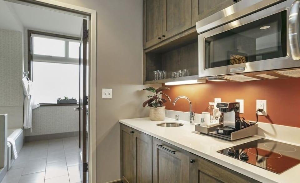 Kitchen out with coffee maker/dishes/pots and pans