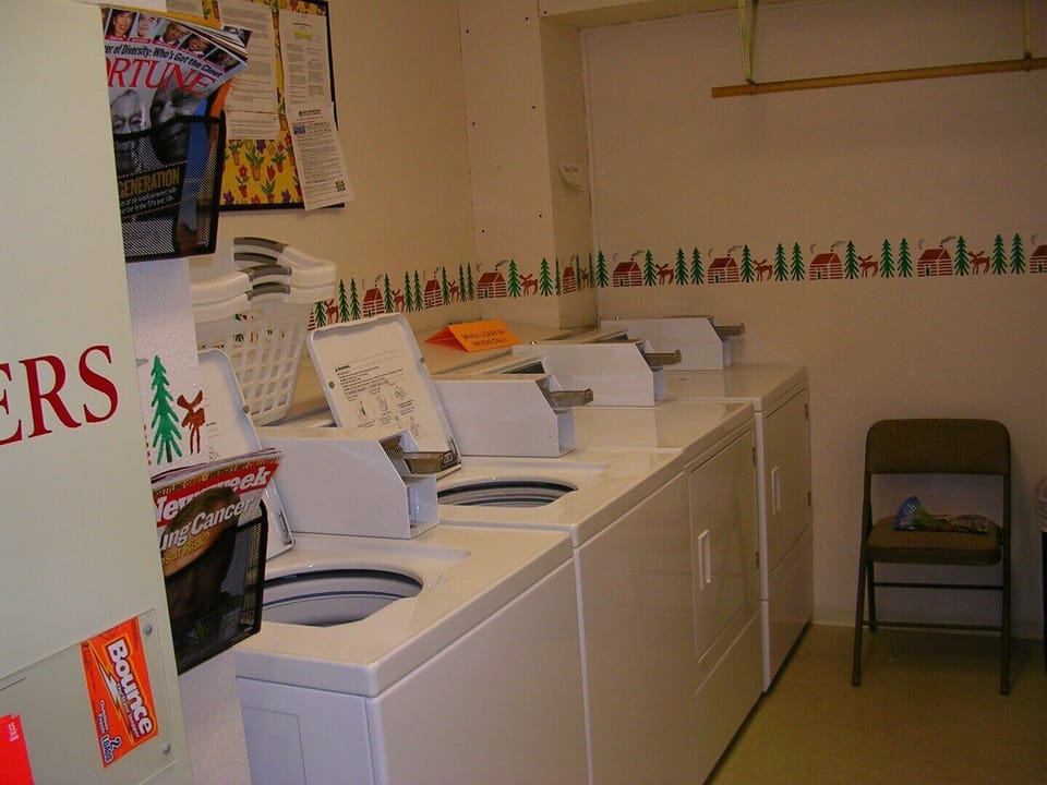 Shared coin operated laundry room.