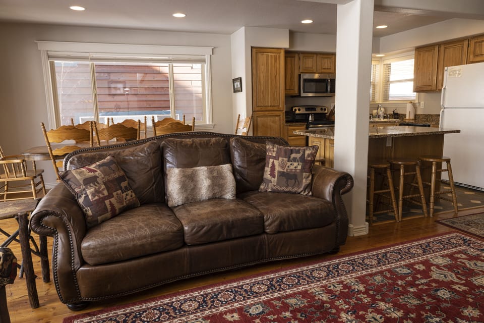 Partial living room view into kitchen.