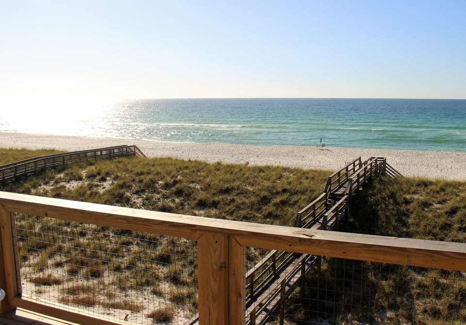 Gather up your beach gear and take the walkway to the beach.
