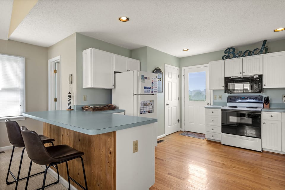 DR24: Dolphin Watch I Top Level Kitchen