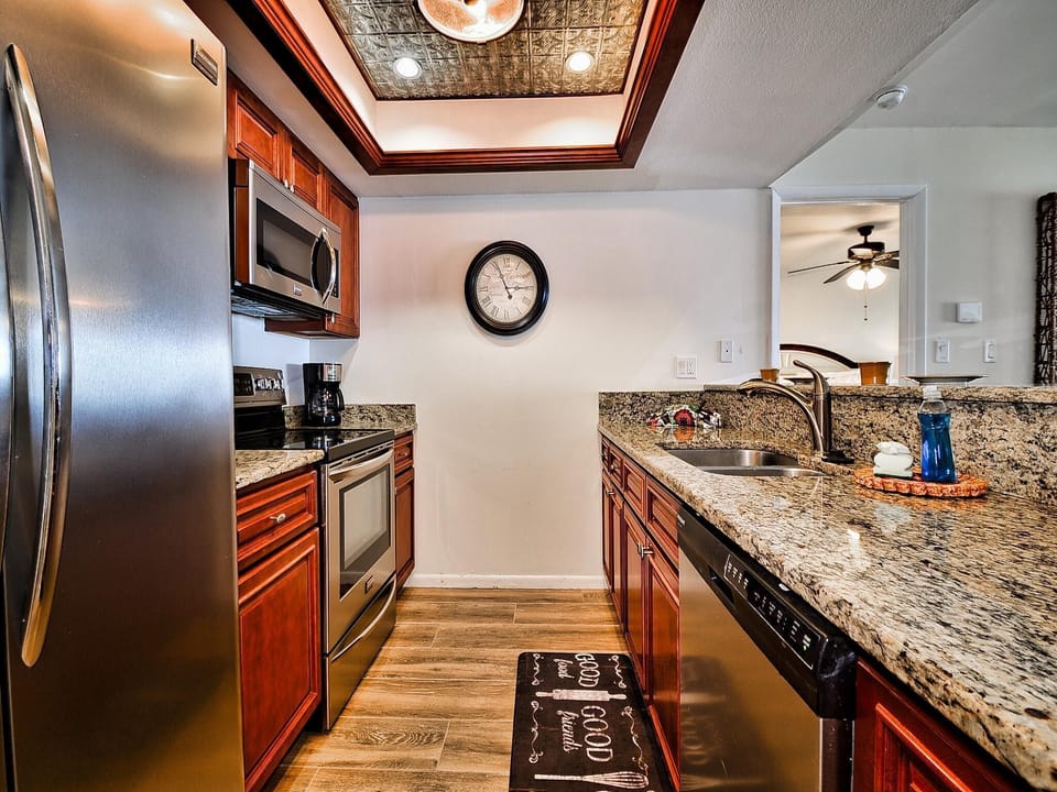 Full kitchen with modern appliances.