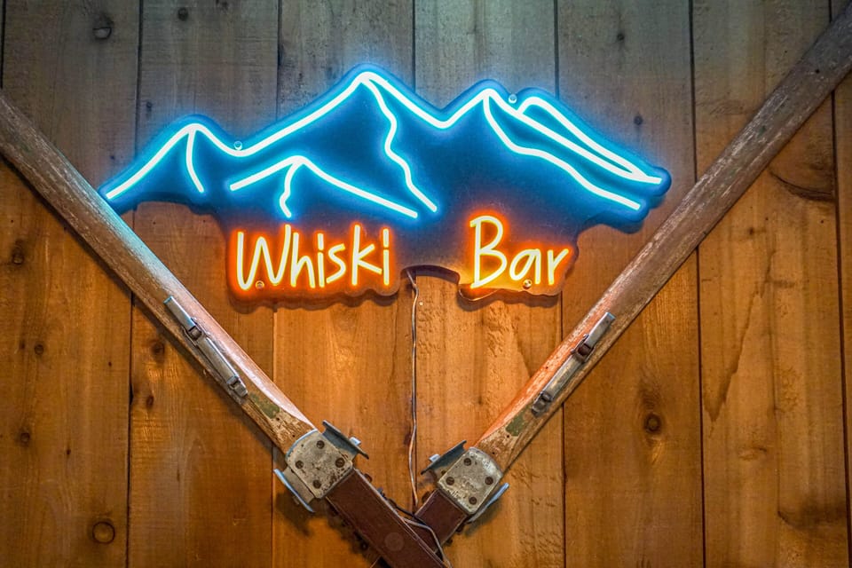 This neon sign is located in the dinig area.