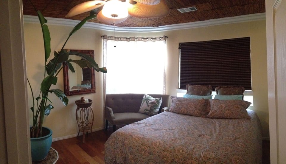 2nd guest bedroom.  Cherry wood floors, walk in closet & bathroom thru side door