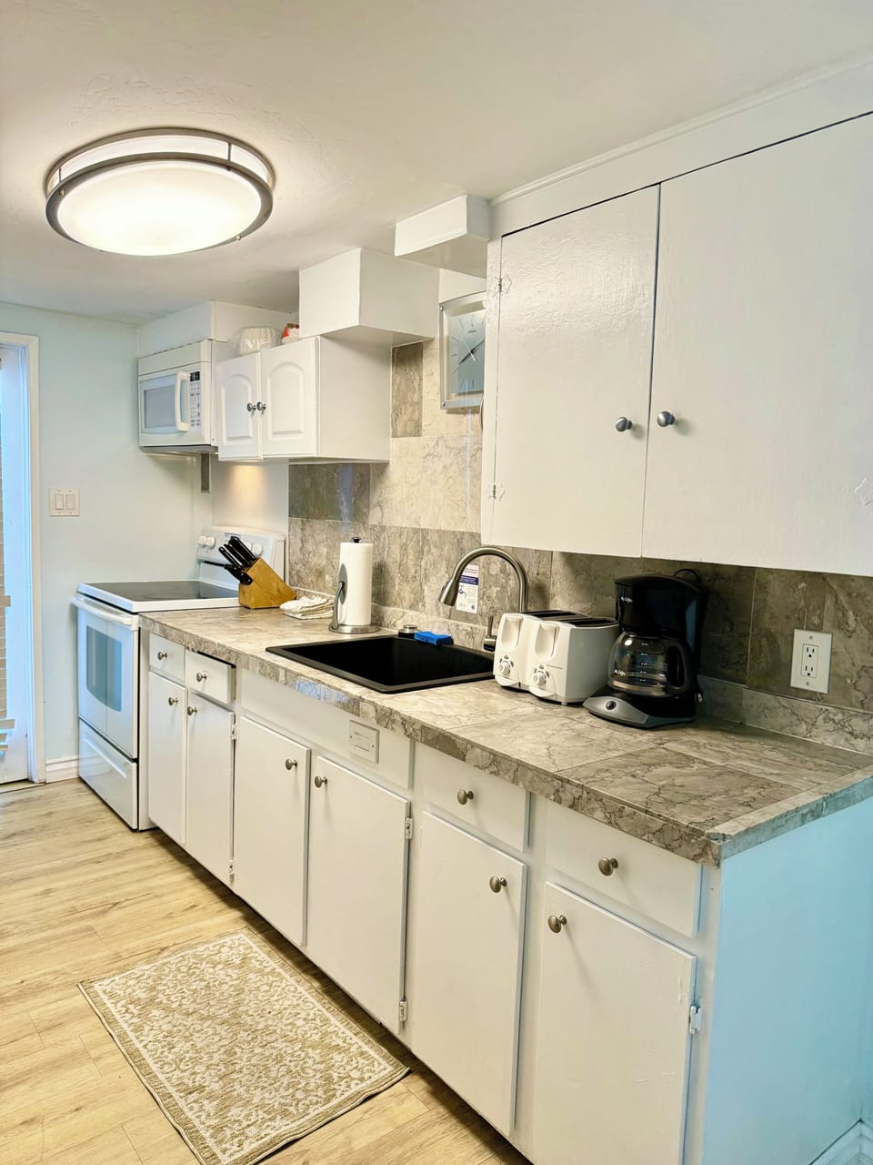 Your fully equipped kitchen makes meal prep easy with modern appliances, ample counter space, and everything you need to cook at your leisure.