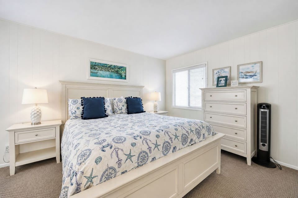 Sink into fresh coastal comfort after a day of adventure. Plush linens, soft lighting, and beachy accents create your perfect seaside retreat.