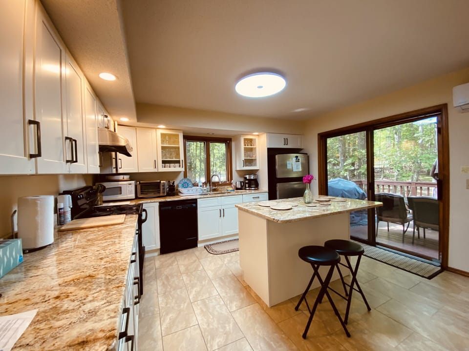 Kitchen area leading to deck. 