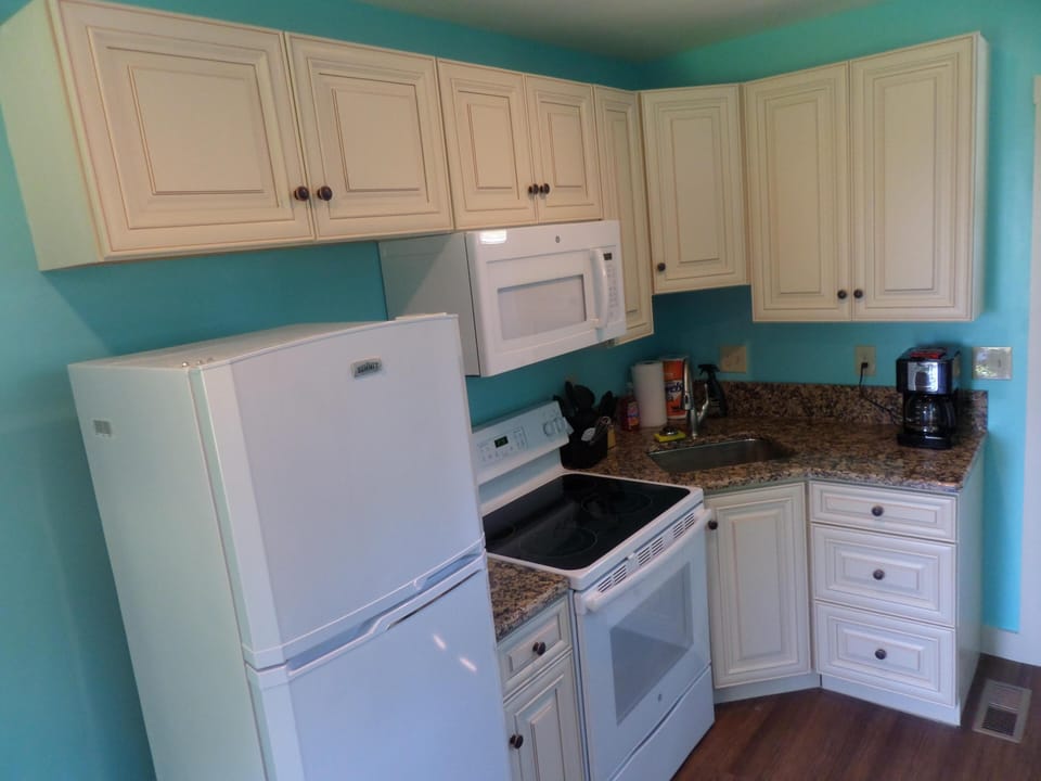 New Kitchen with granite counter tops.