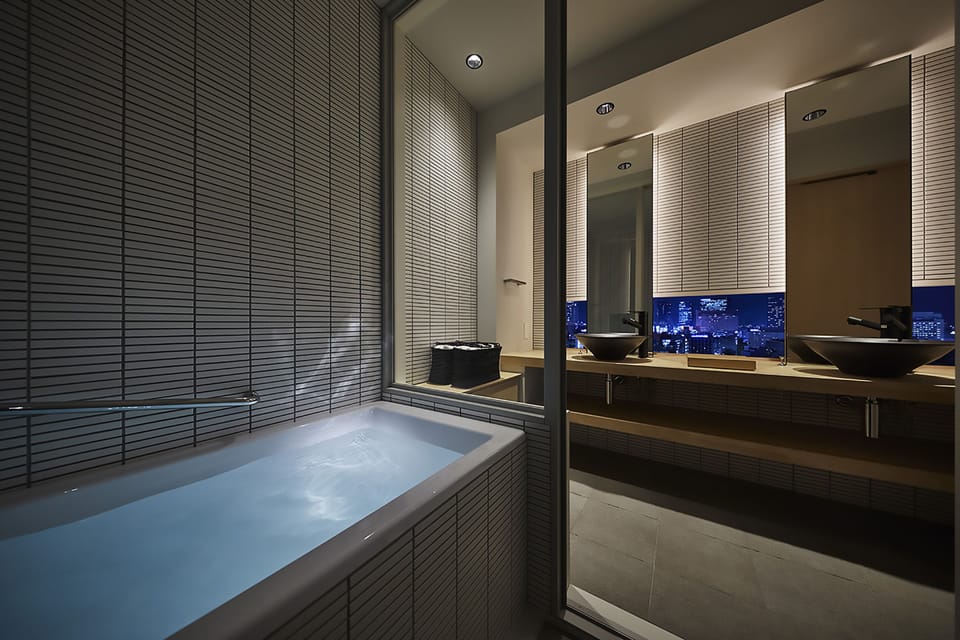 YUEN Suite, Non Smoking, City View | Bathroom | Hair dryer, slippers, bidet, towels