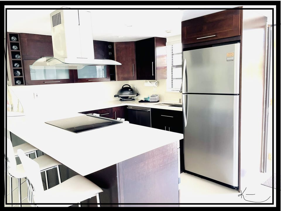Kitchen. Balcony view to parking lot