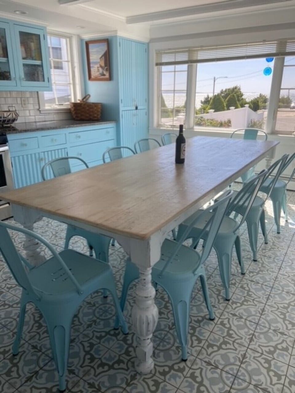 Kitchen with big table for 10.  There is also a 10-person picnic table outside.