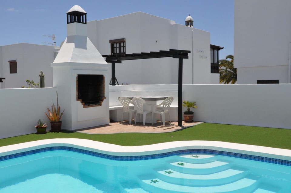 Large brick built BBQ and seating area