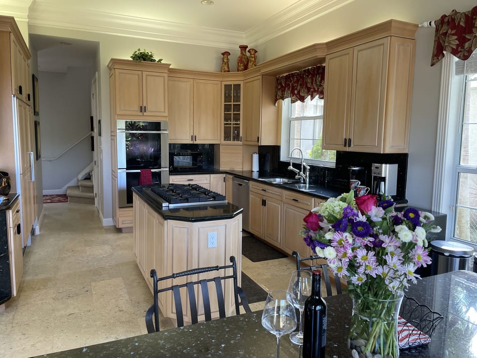 Gourmet kitchen:Gas stovetop;double oven. Subzero fridge and freezer, wine cooler
