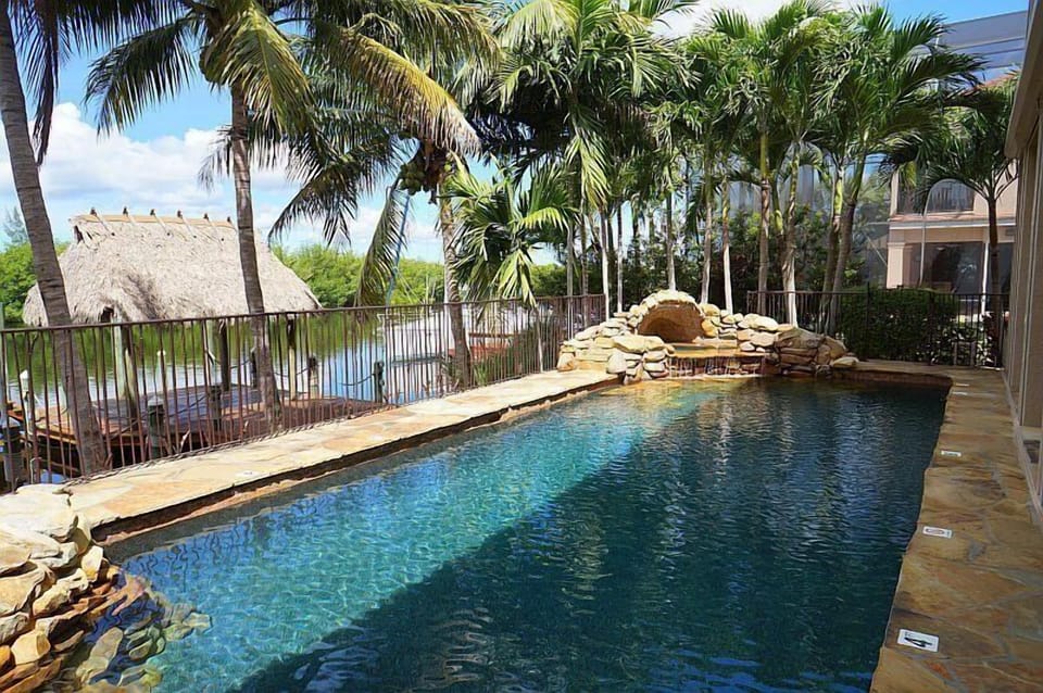Heated pool and hot tub facing dock and waterfront. Hot tub heats to 100+ in 1hr